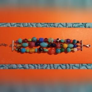 Antique Beads are the feature of this 3 Strand Bracelet.